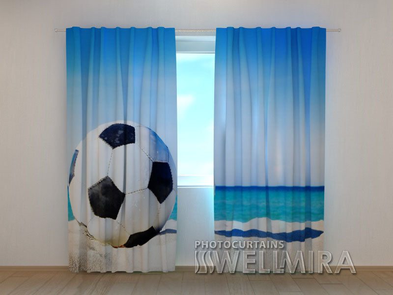 Football_ball_on_the_beach_w